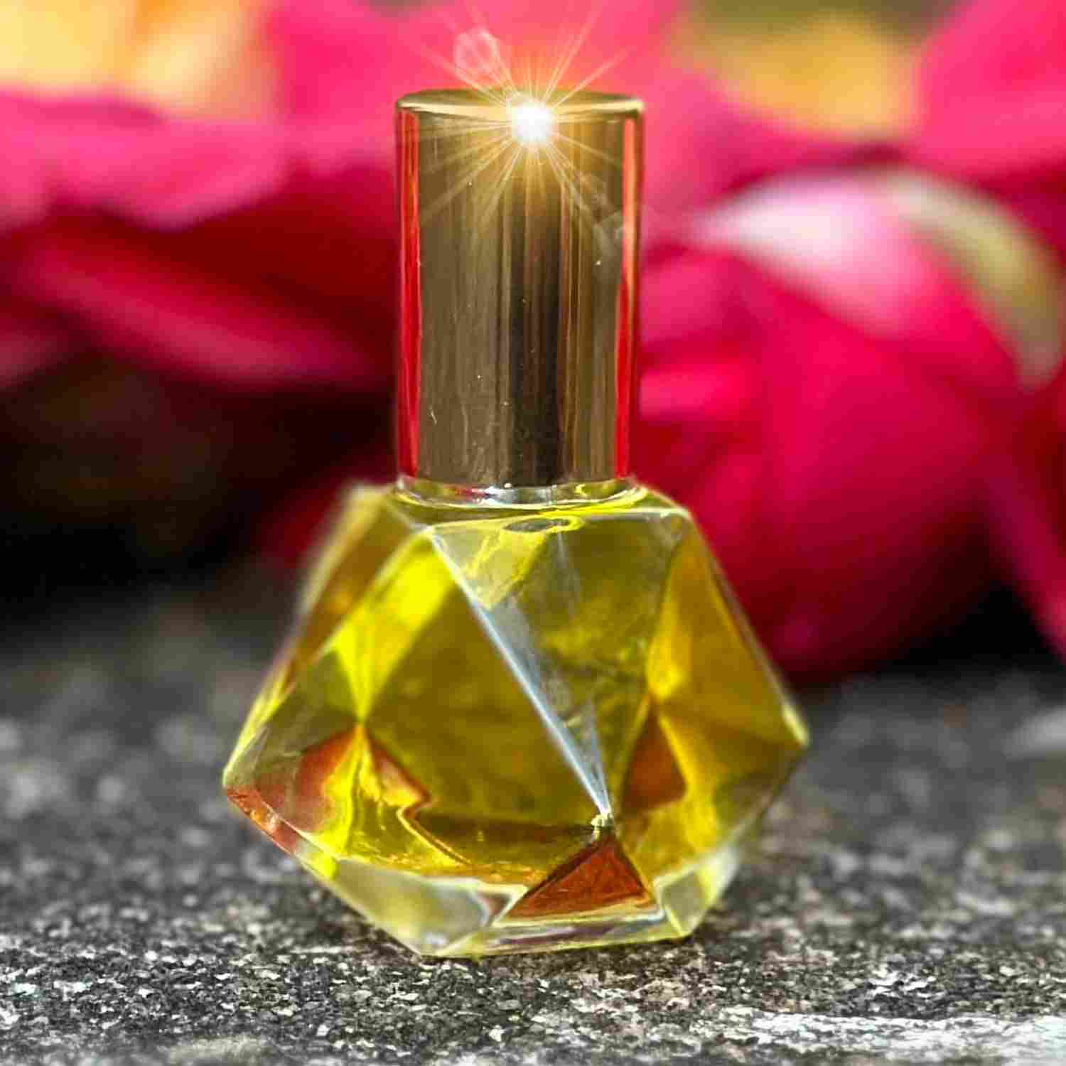 8ml Flora Luxuria Perfume Oil by Homesteader's Dream on stone bench