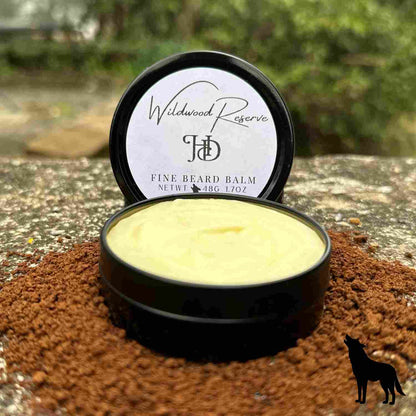 Wildwood Reserve Fine Beard Balm, 1.7 oz, 48g net weight, open tin revealing creamy yellow nourishing and taming balm